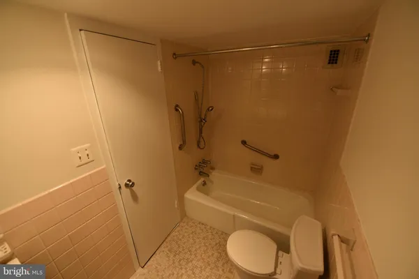 a view of gallery with wooden floor