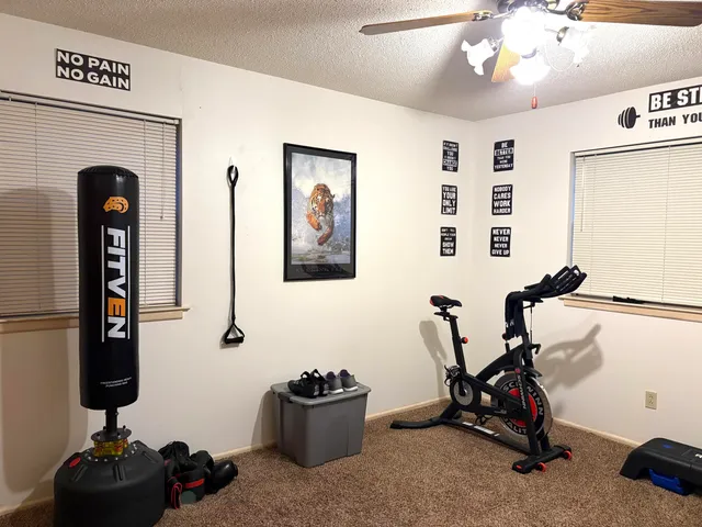a view of a room with gym equipment