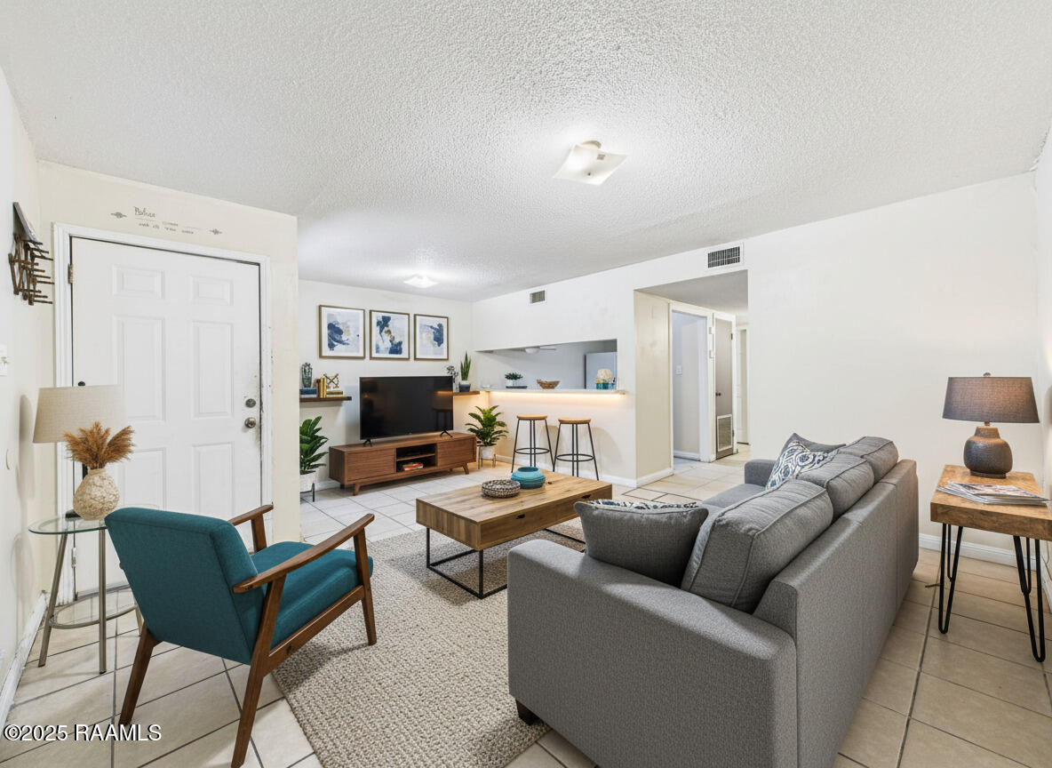 102 Marigny Circle, Unit C Duson, LA 70529 - Photo 2 of 13 Living room (56)