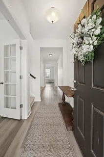 a lobby with furniture and flowers