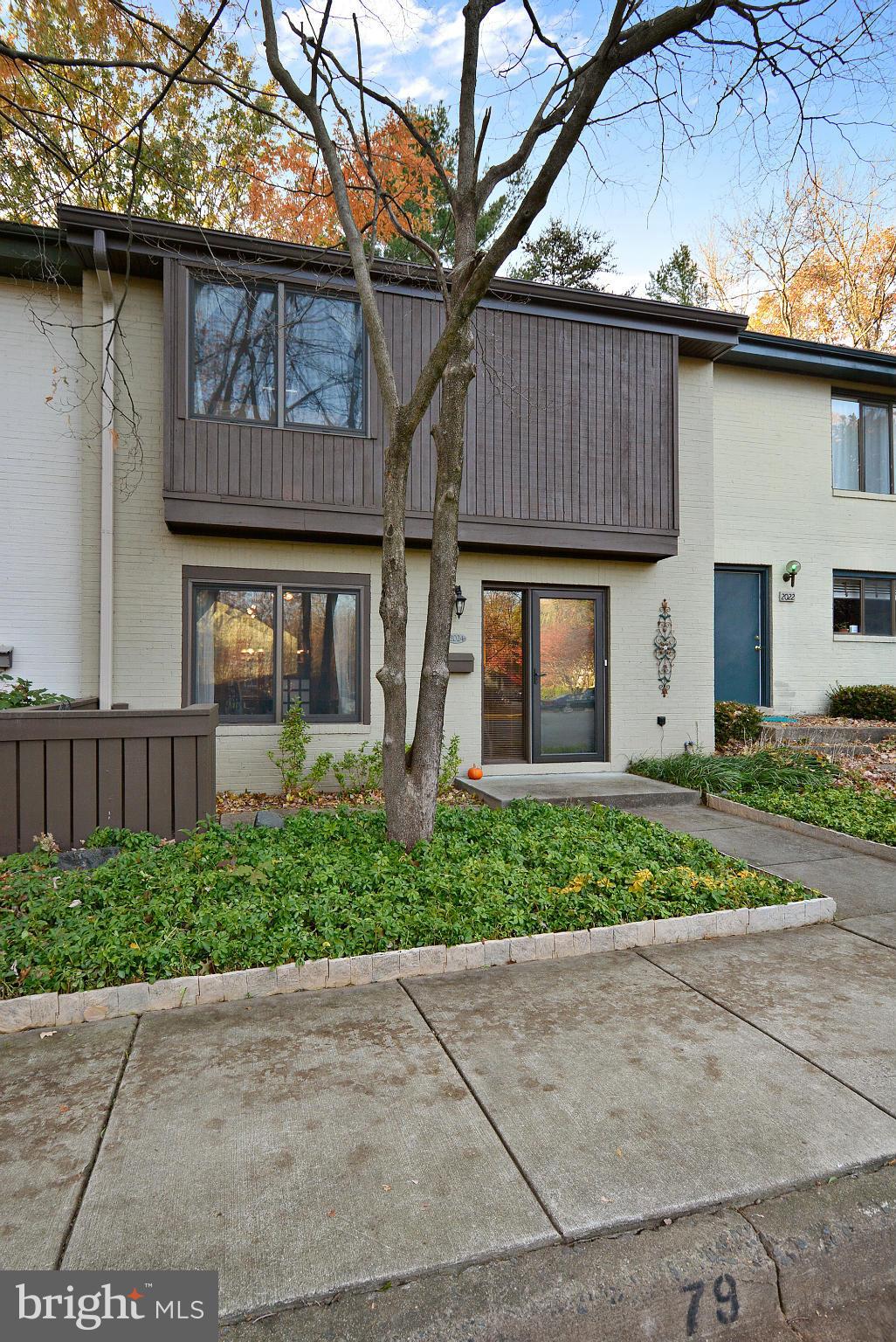 2024 Golf Course Drive Reston, VA 20191 - Photo 1 of 30 a front view of a house with garden
