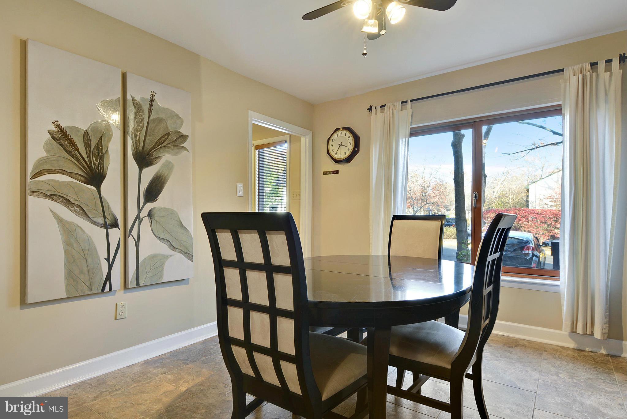 2024 Golf Course Drive Reston, VA 20191 - Photo 16 of 30 a view of a dining room with furniture window and outside view