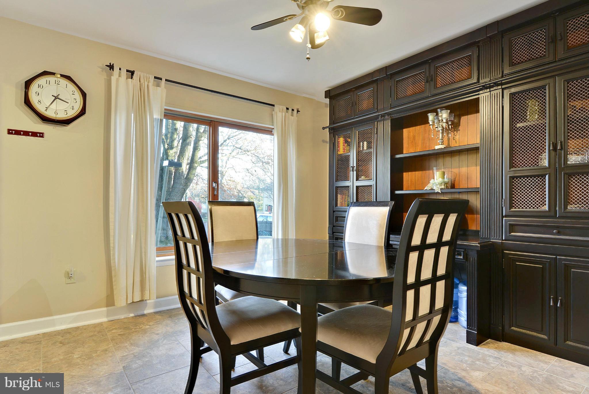 2024 Golf Course Drive Reston, VA 20191 - Photo 17 of 30 a view of a dining room with furniture window and wooden floor