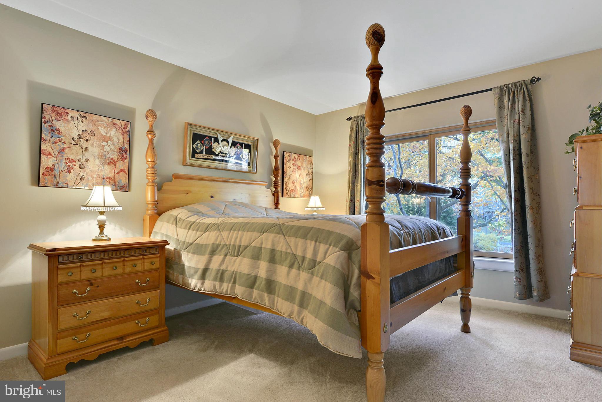 2024 Golf Course Drive Reston, VA 20191 - Photo 19 of 30 a bedroom with a bed and a window