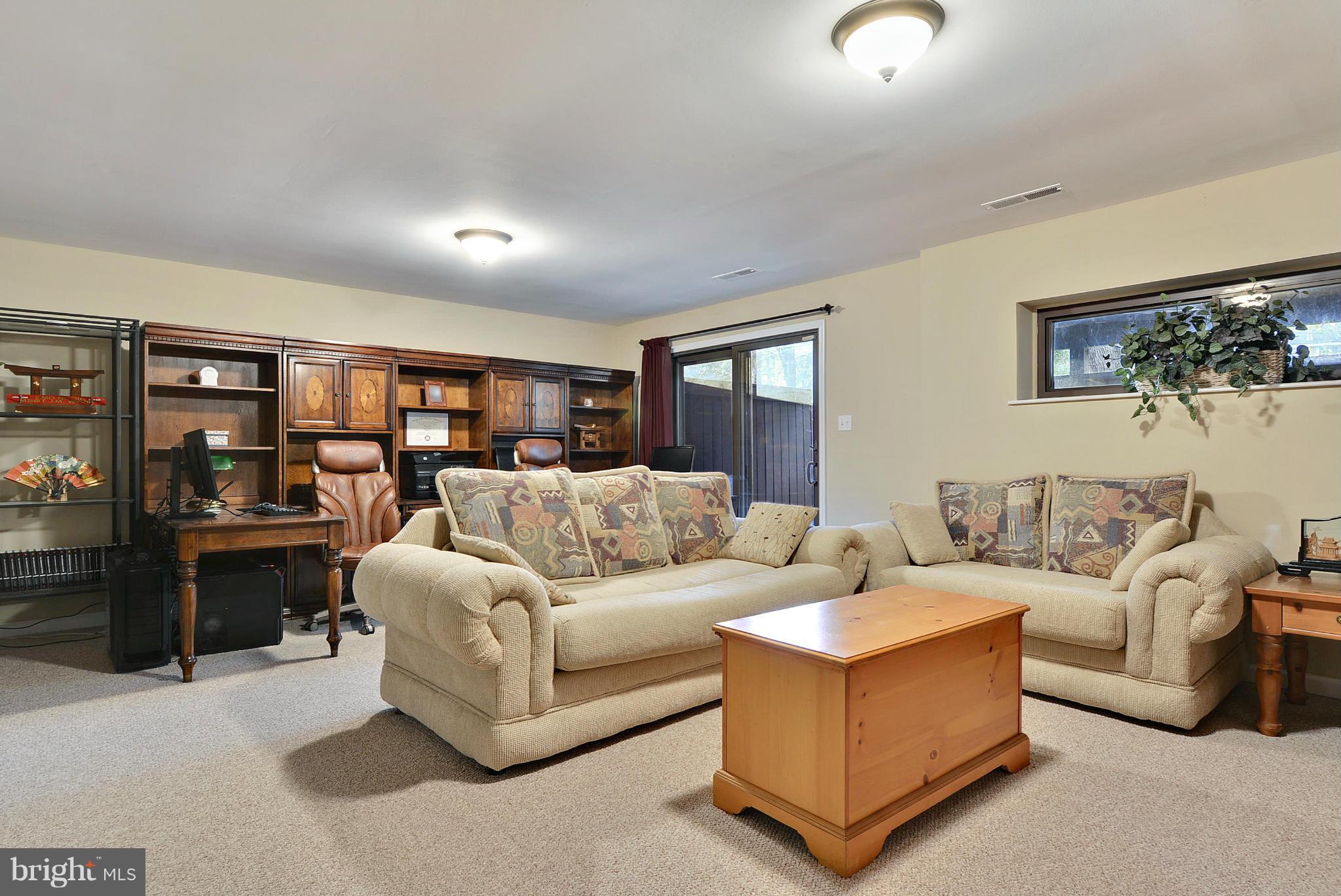 2024 Golf Course Drive Reston, VA 20191 - Photo 24 of 30 a living room with furniture and large window