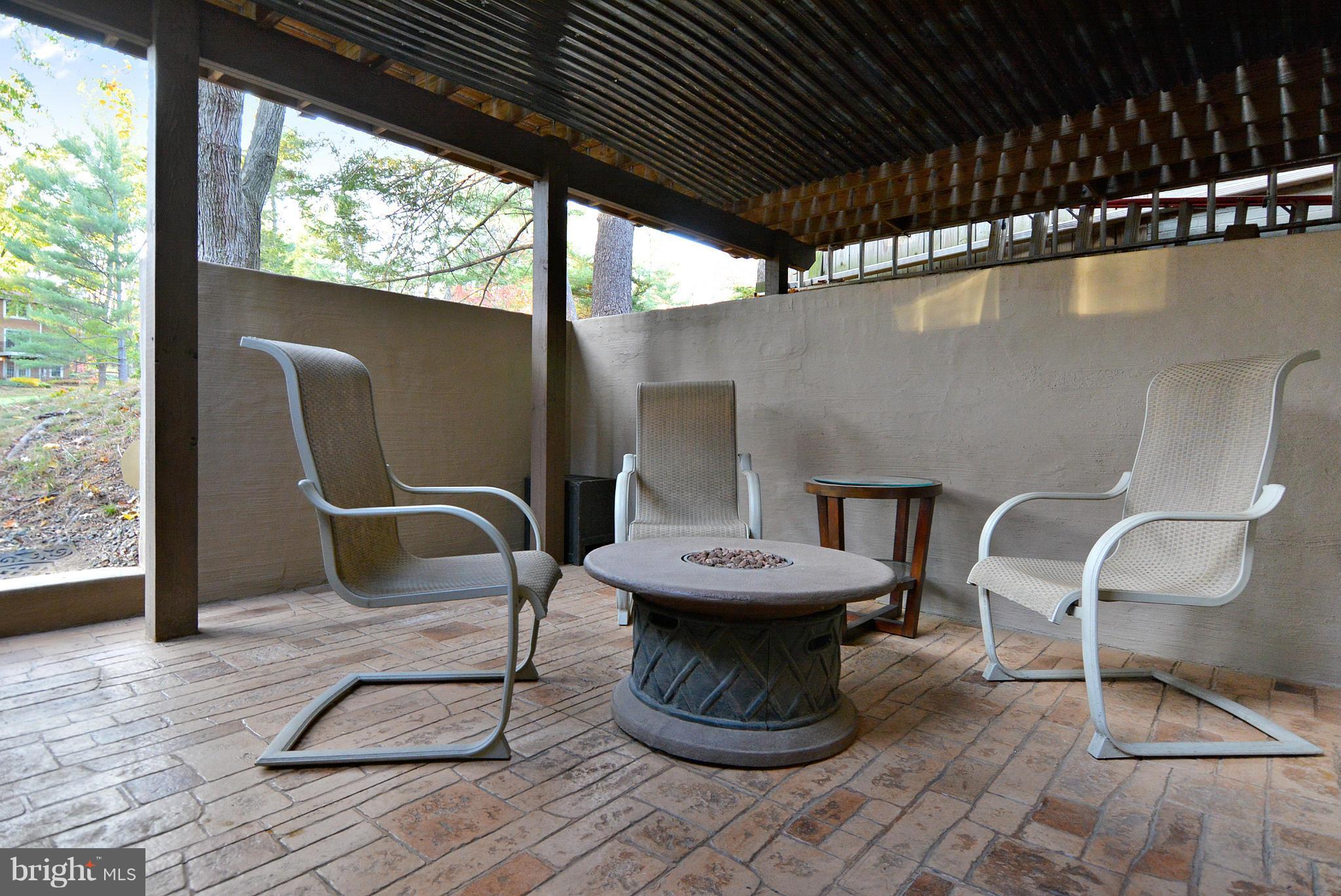 2024 Golf Course Drive Reston, VA 20191 - Photo 29 of 30 a view of a chairs and table in the patio
