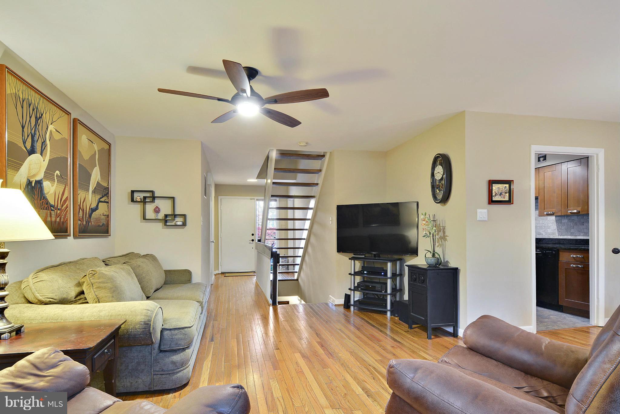 2024 Golf Course Drive Reston, VA 20191 - Photo 6 of 30 a living room with furniture and a flat screen tv