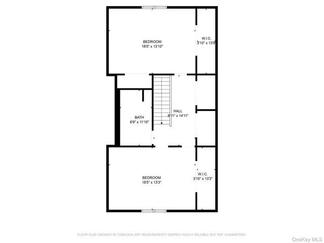 a picture of a bench in front of a wall