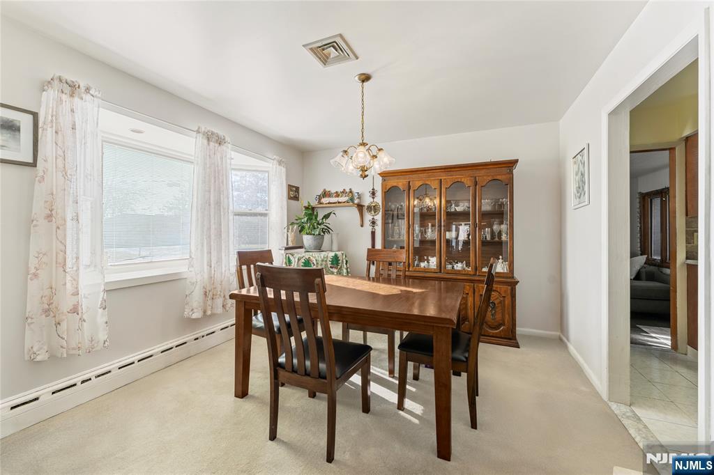 60 White Oak Road Parsippany, NJ 07054 - Photo 13 of 24 a view of a dining room with furniture window and outside view