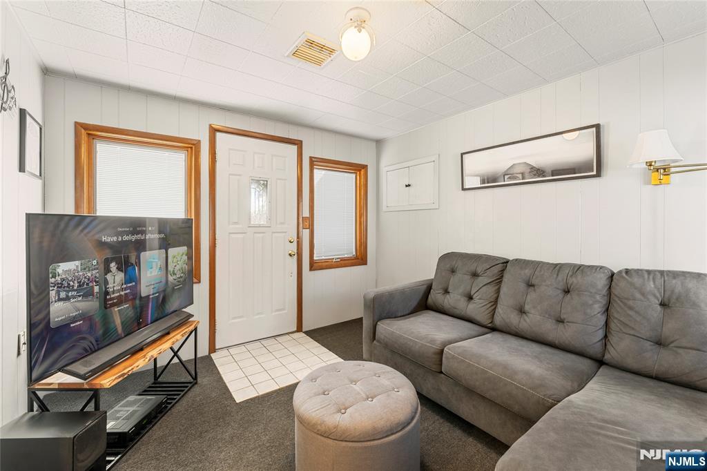 60 White Oak Road Parsippany, NJ 07054 - Photo 14 of 24 a living room with furniture and a couch