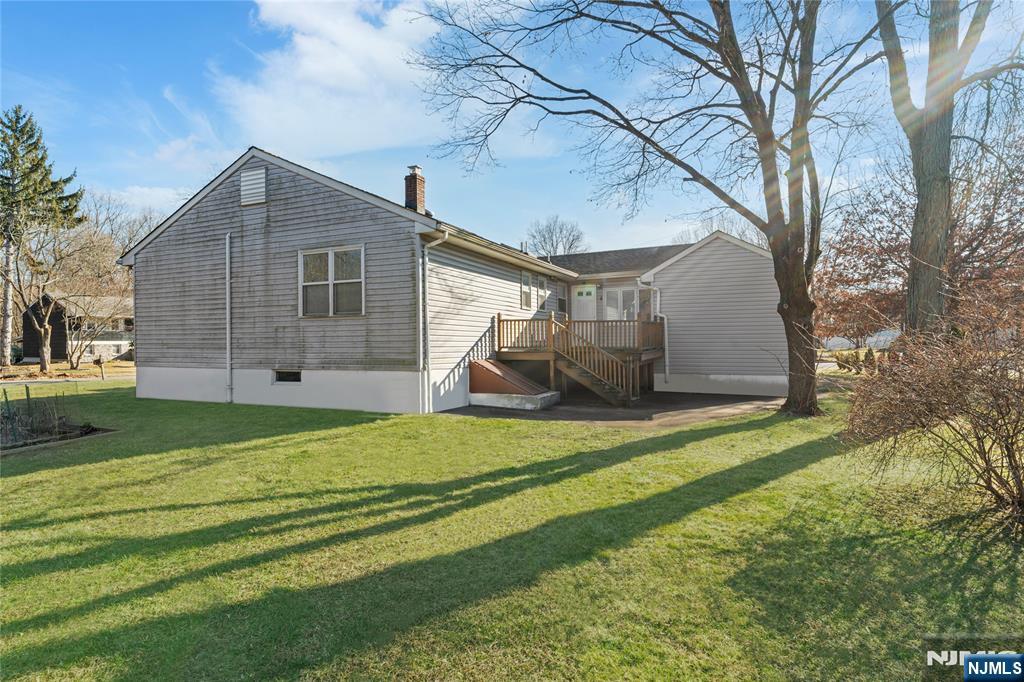 60 White Oak Road Parsippany, NJ 07054 - Photo 20 of 24 a house view with a backyard space