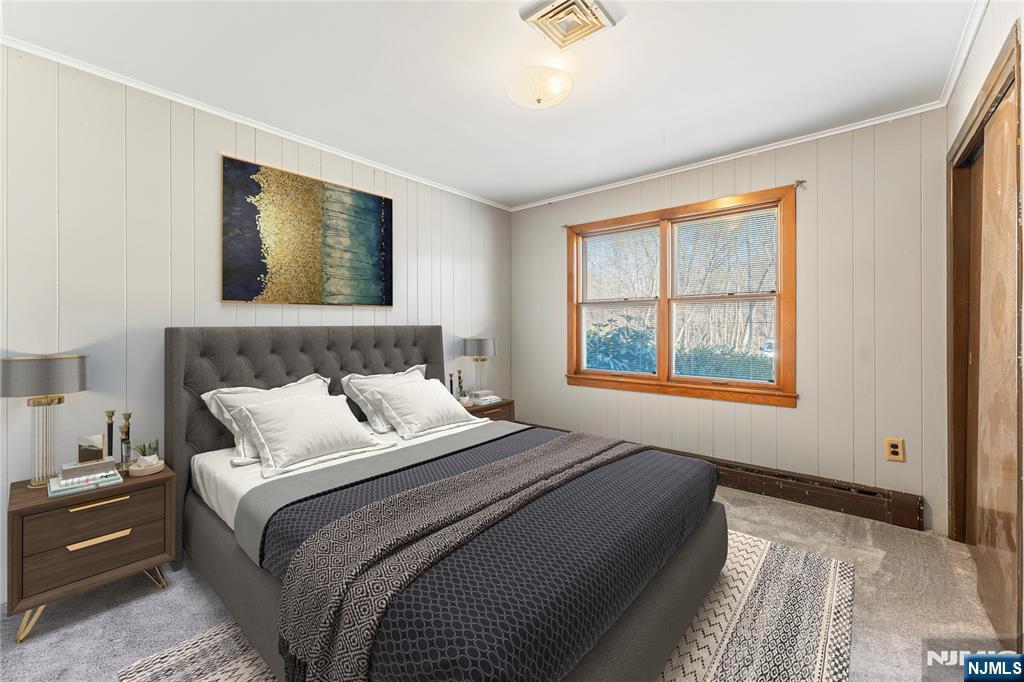 60 White Oak Road Parsippany, NJ 07054 - Photo 7 of 24 a bedroom with a bed and a window