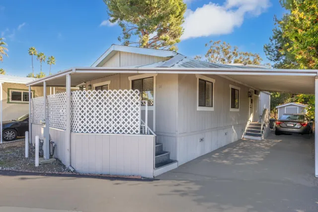 a front view of a house with a garage