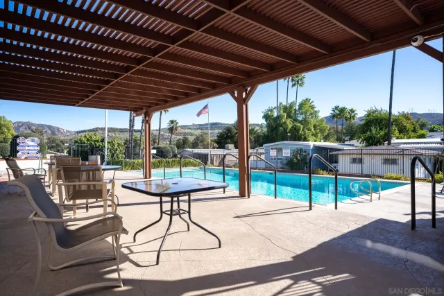 a room with furniture and wooden floor