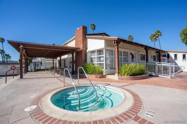 a view of a house with swimming pool