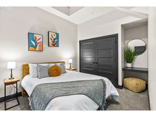 a bedroom with a bed and a walk in closet