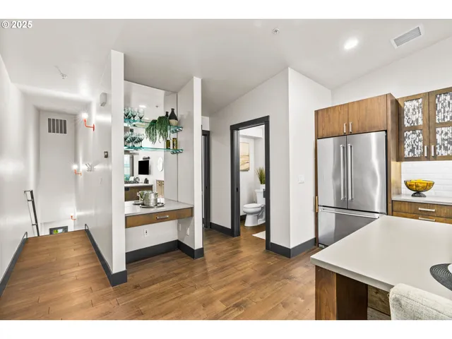 a bedroom with a bed and a couch