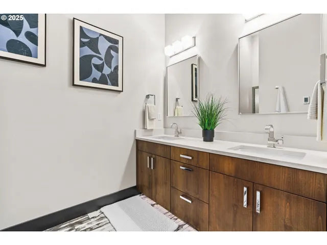 a bathroom with a sink and mirror