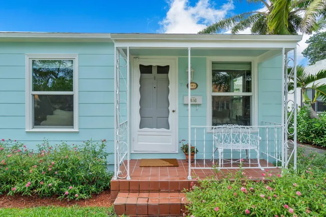 front view of a house with a small yard