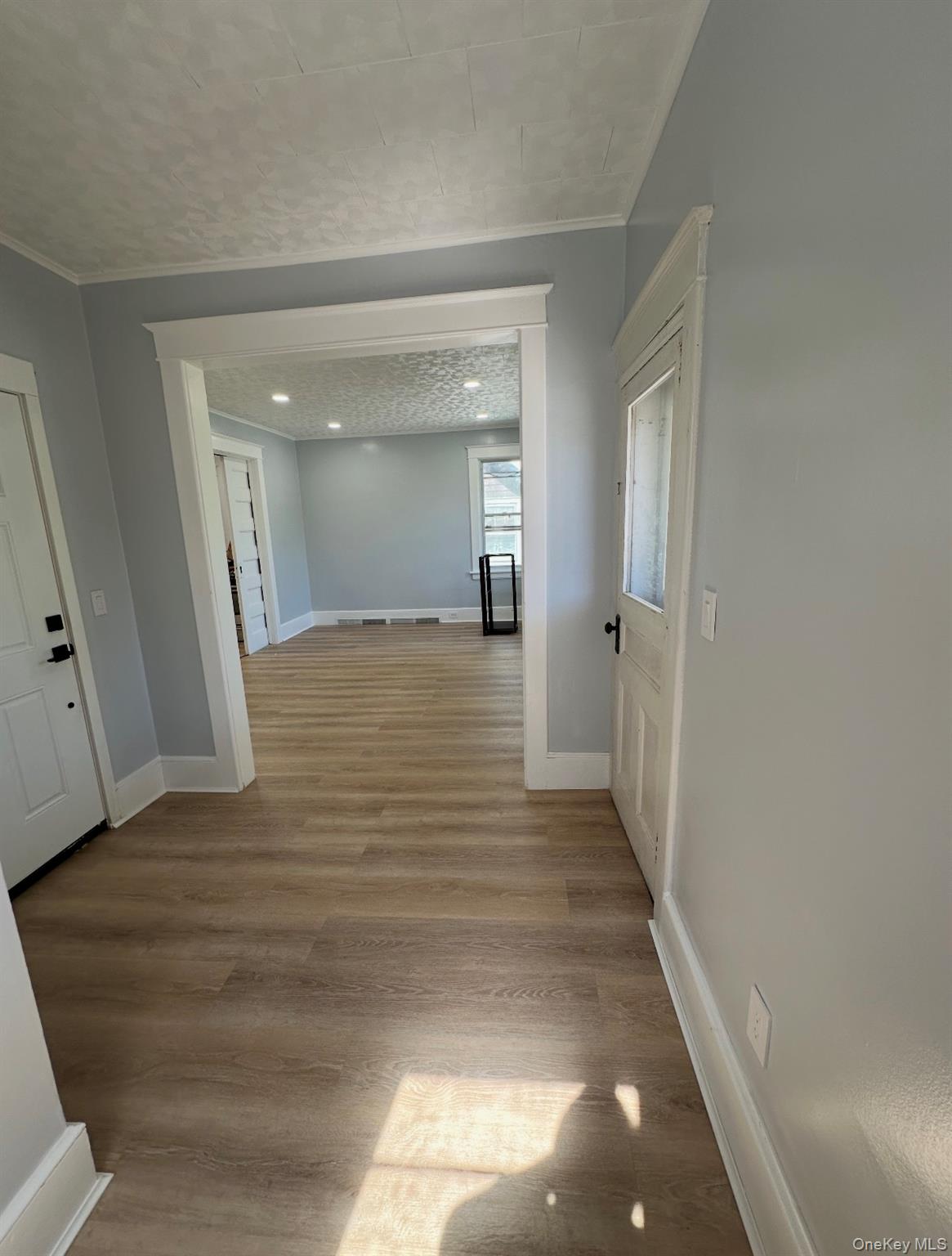 15 Forbus Street Poughkeepsie, NY 12601 - Photo 7 of 9 a view of a hallway with wooden floor