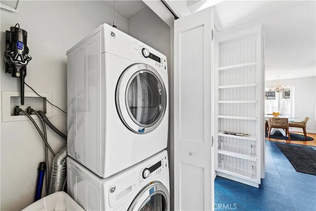 a view of a storage & utility room with washer and dryer