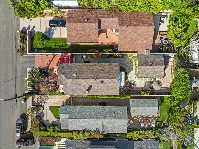 an aerial view of a house with a swimming pool