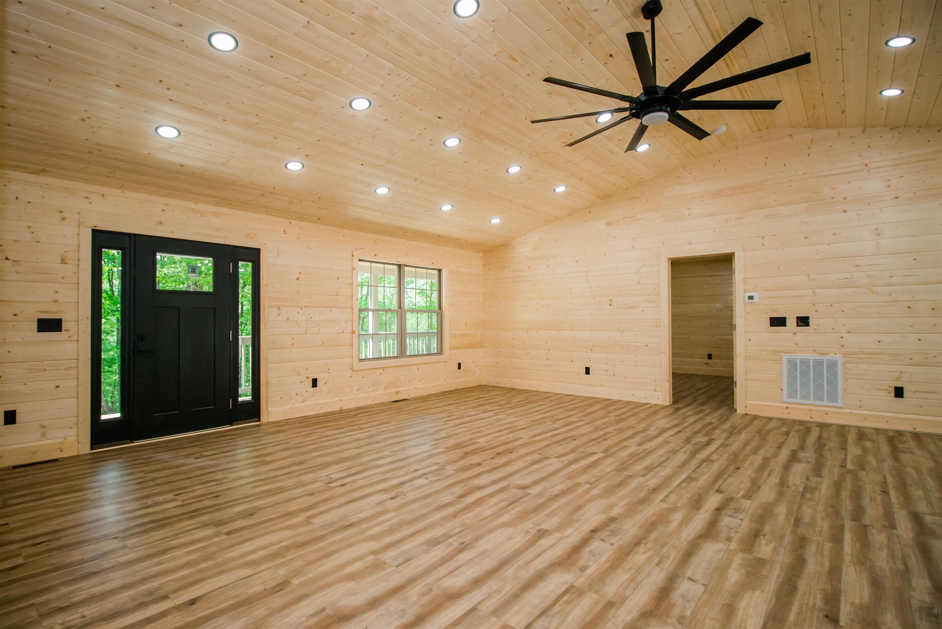 60 Trout Pass Mathias, WV 26812 - Photo 2 of 46 wooden floor in an empty room with a window