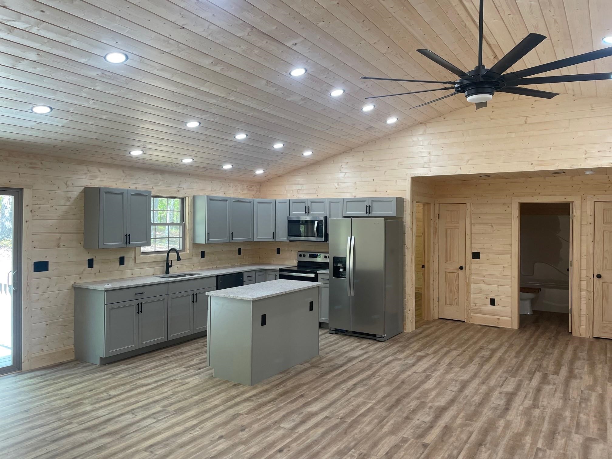 60 Trout Pass Mathias, WV 26812 - Photo 3 of 46 a kitchen with refrigerator and cabinets