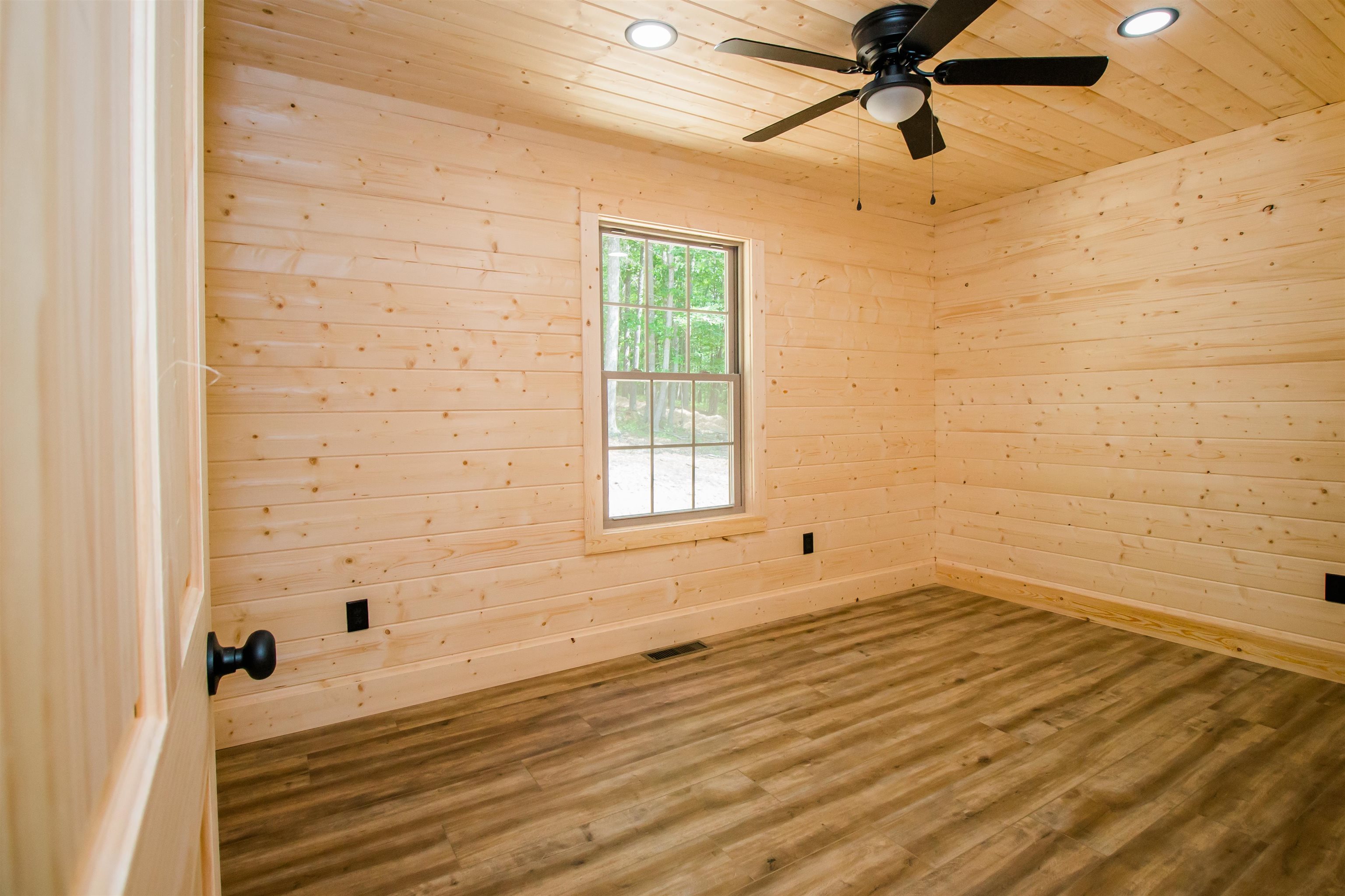 60 Trout Pass Mathias, WV 26812 - Photo 33 of 46 a view of a room with a wooden floor and white walls