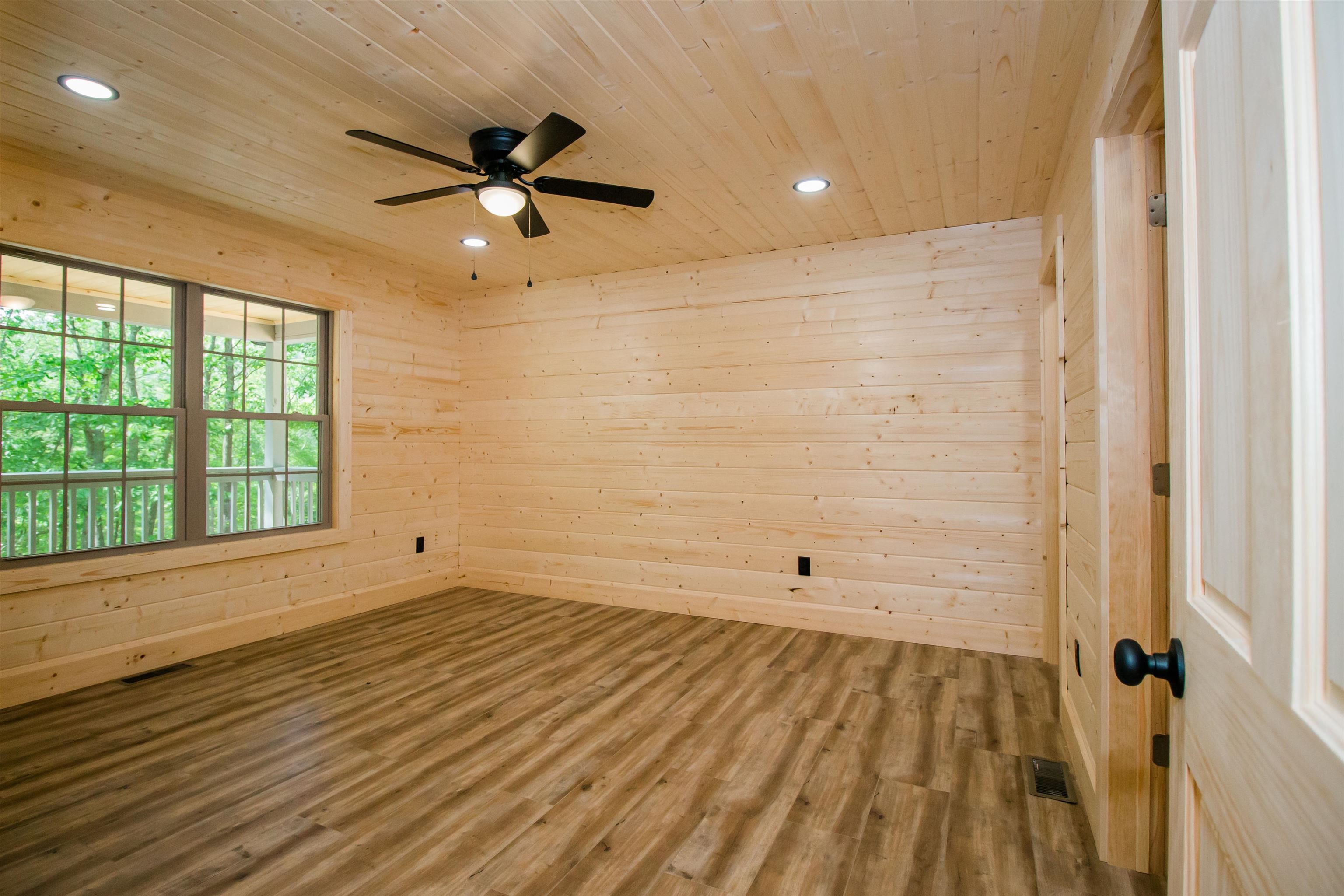 60 Trout Pass Mathias, WV 26812 - Photo 36 of 46 wooden floor in an empty room with a window