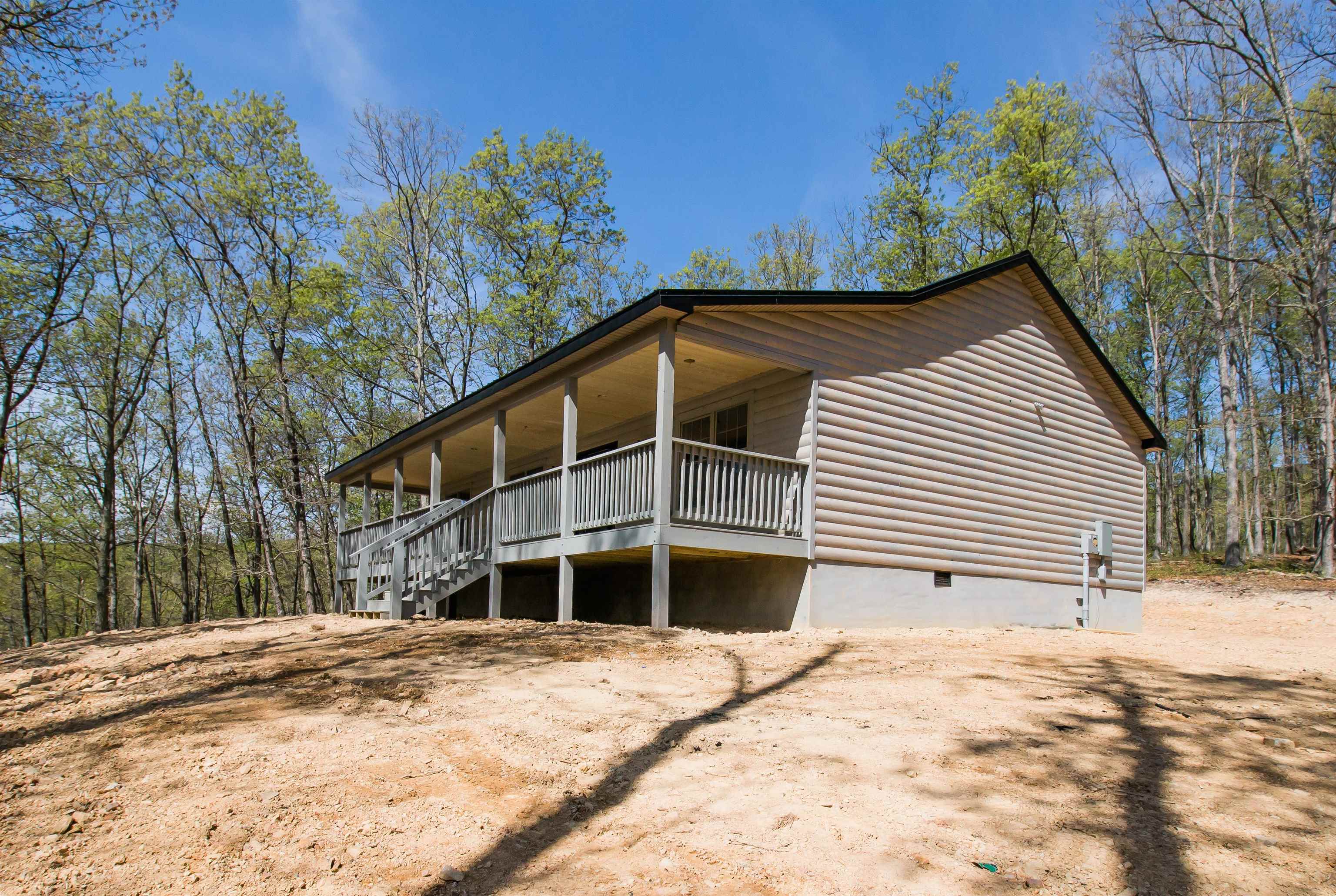 60 Trout Pass Mathias, WV 26812 - Photo 41 of 46 a front view of a house with a yard