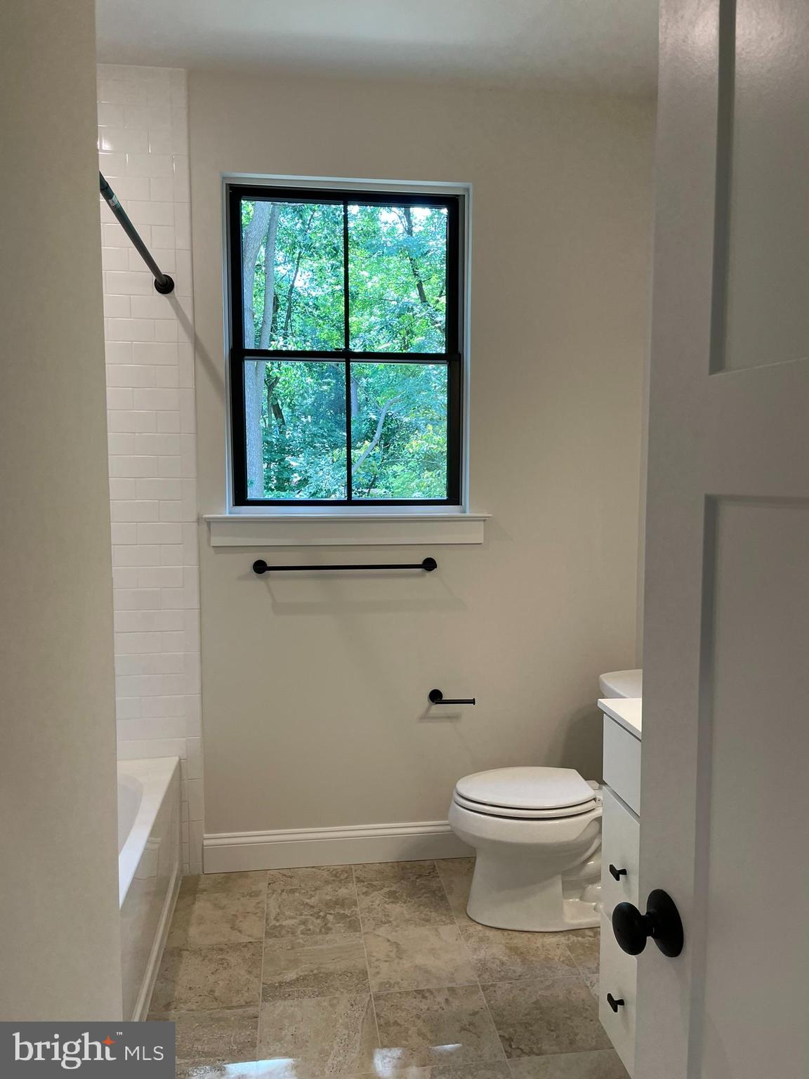 723 B Saylors Mill Road Spring City, PA 19475 - Photo 23 of 25 a bathroom with a toilet a window and a shower