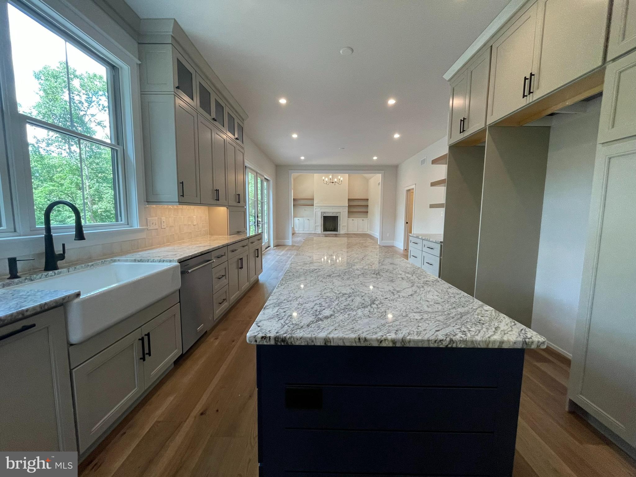 723 B Saylors Mill Road Spring City, PA 19475 - Photo 8 of 25 a large kitchen with kitchen island a sink stainless steel appliances and window