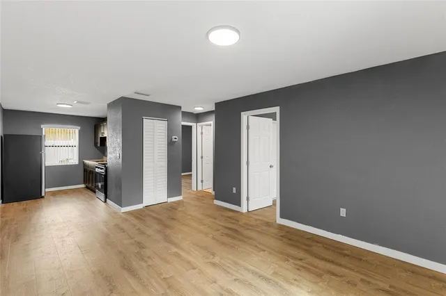 a view of a livingroom with wooden floor