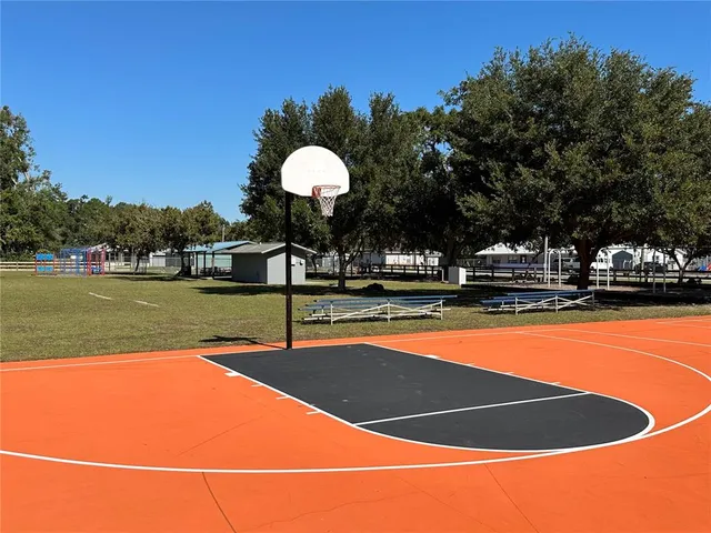 a view of swimming pool with outdoor seating