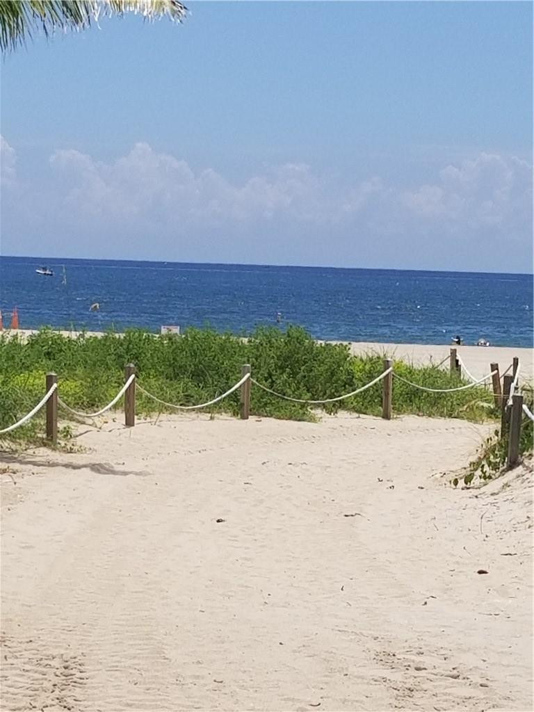 3208 Colony Club Road, Unit 6 Pompano Beach, FL 33062 - Photo 16 of 21 a view of beach and ocean view