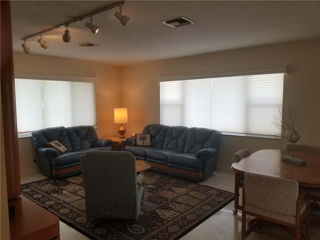 3208 Colony Club Road, Unit 6 Pompano Beach, FL 33062 - Photo 6 of 21 a living room with furniture and a window