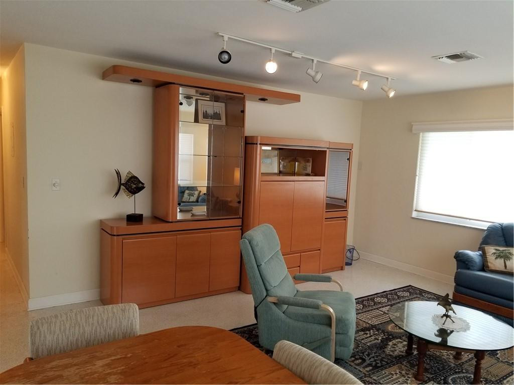 3208 Colony Club Road, Unit 6 Pompano Beach, FL 33062 - Photo 7 of 21 a living room with furniture and a window