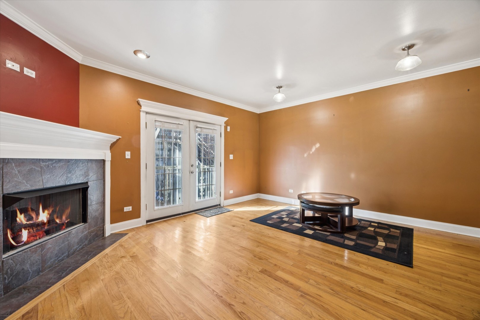 641 East 50th Street, Unit 1 Chicago, IL 60615 - Photo 6 of 15 a living room with furniture and a fireplace