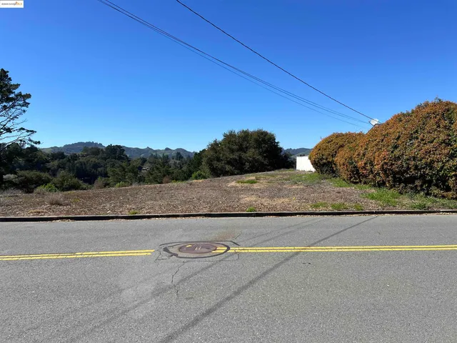 a view of a swimming pool and an outdoor space