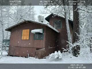 30366 Bridger Way Oak Run, CA 96069 - Photo 1 of 13 a front view of a house with a yard