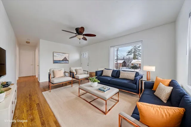 a kitchen with stainless steel appliances a refrigerator and cabinets