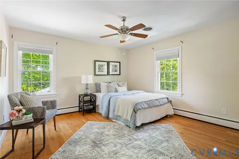 a view of a livingroom with furniture and a window