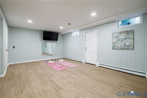 a living room with furniture and window