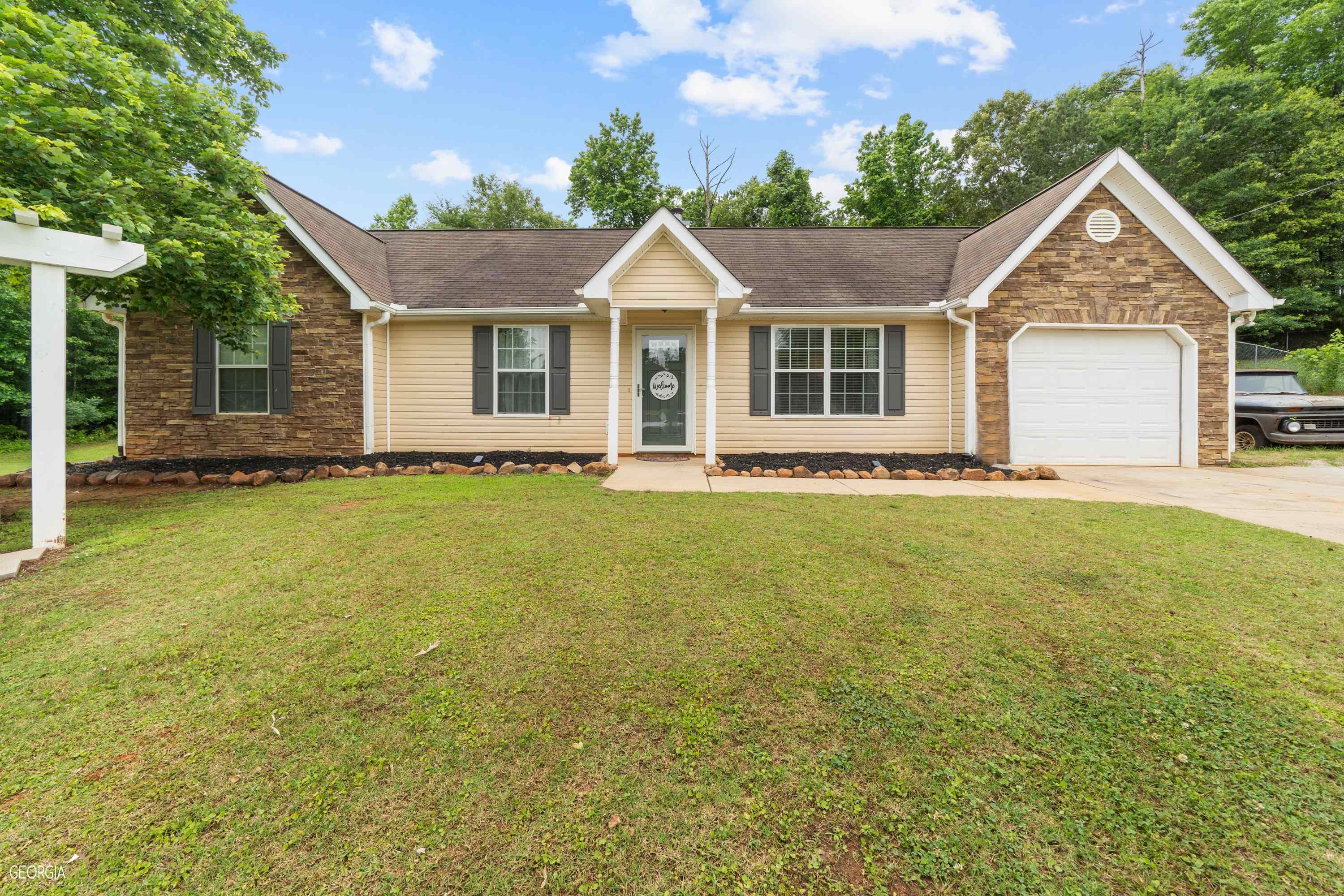 348 Autumn Ridge Trail Gray, GA 31032 - Photo 1 of 1 a front view of a house with yard