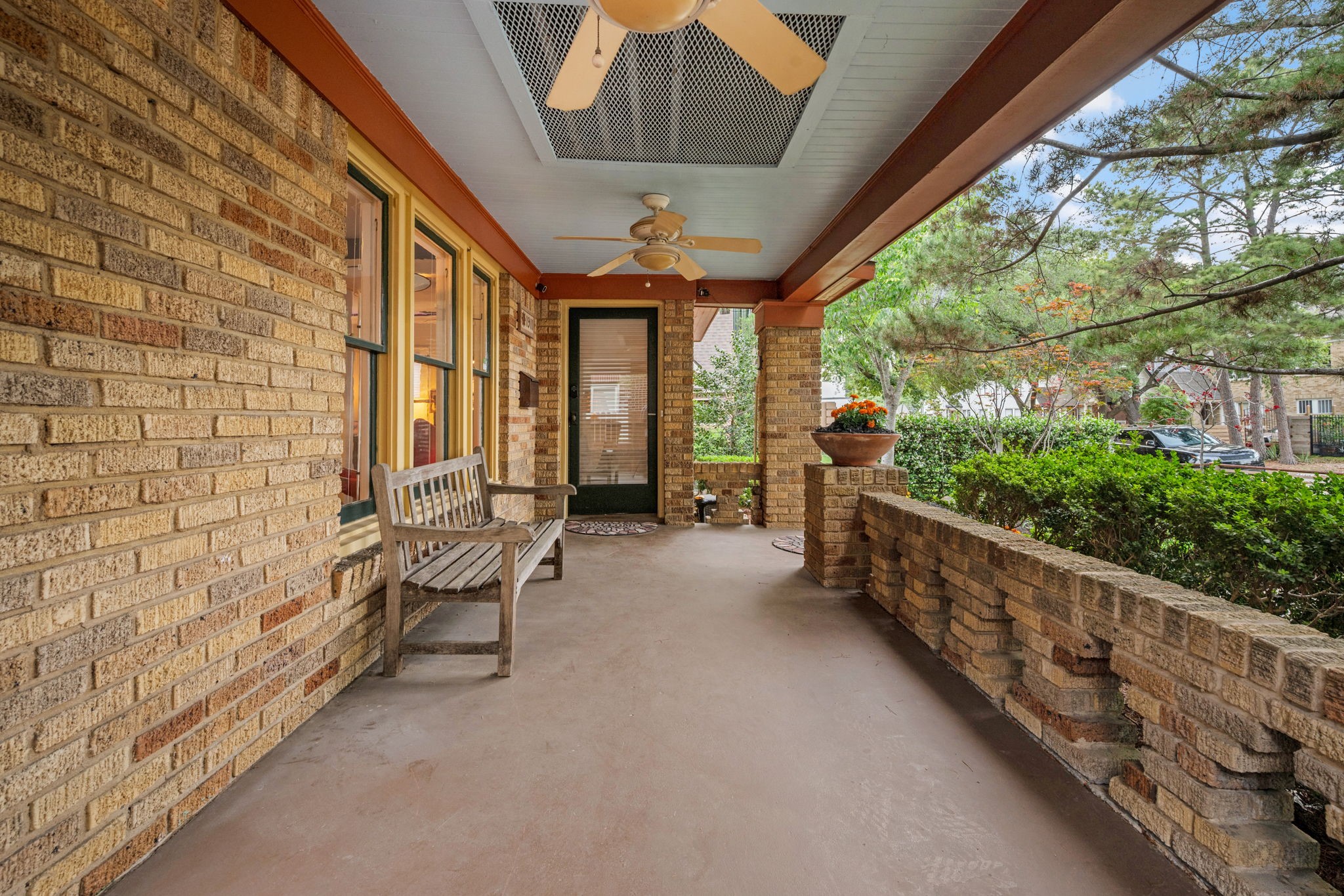 1911 Harold Street Houston, TX 77098 - Photo 2 of 36 Spacious L-shaped covered front porch (14’ x 21') provides an inviting first impression and a comfortable space for outdoor relaxation, complete with a ceiling fan.