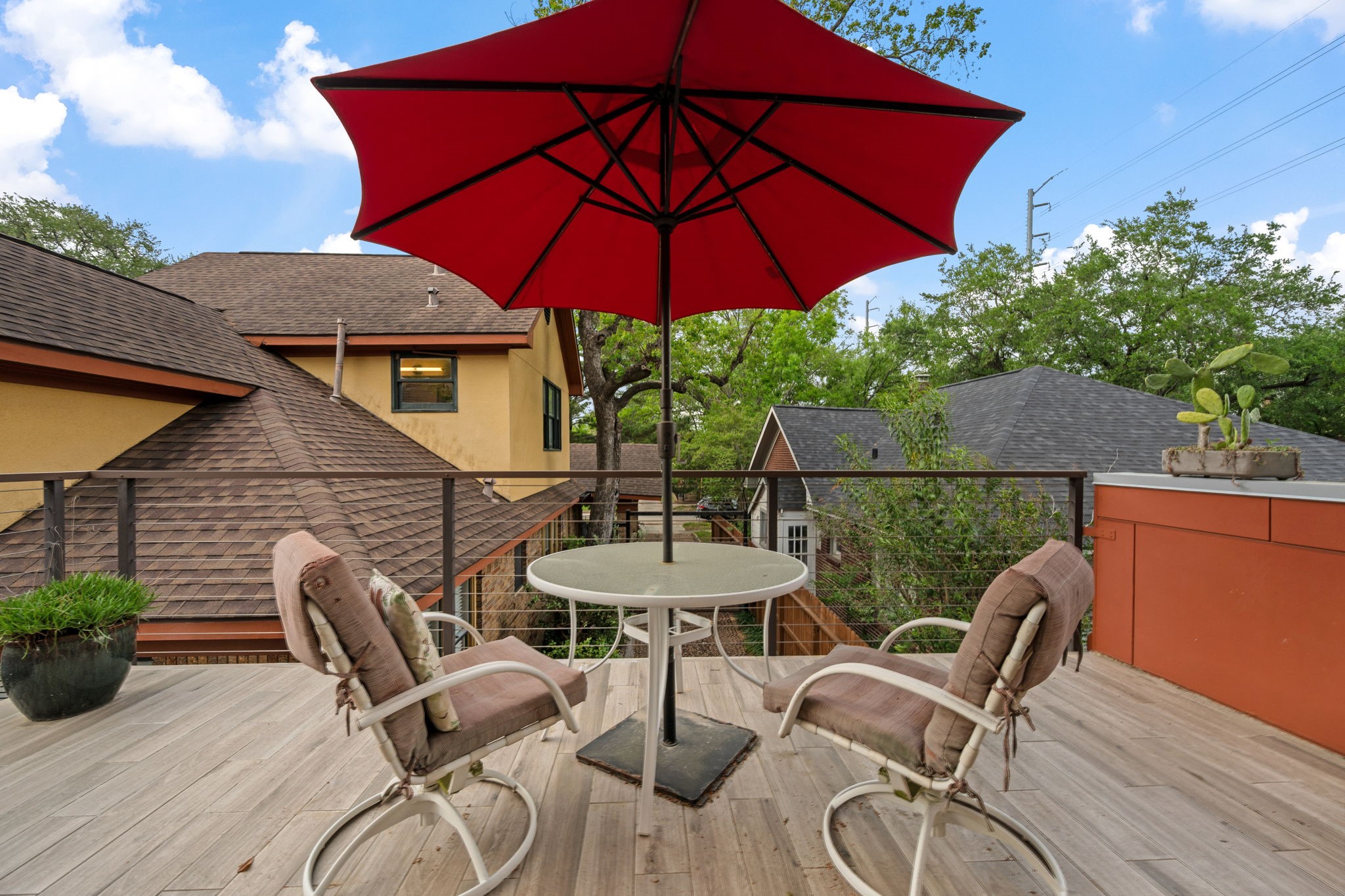 1911 Harold Street Houston, TX 77098 - Photo 22 of 36 How about this fabulous patio just off the garage apartment—perfect for kicking back, hosting happy hour, or enjoying a little sunshine between swims.