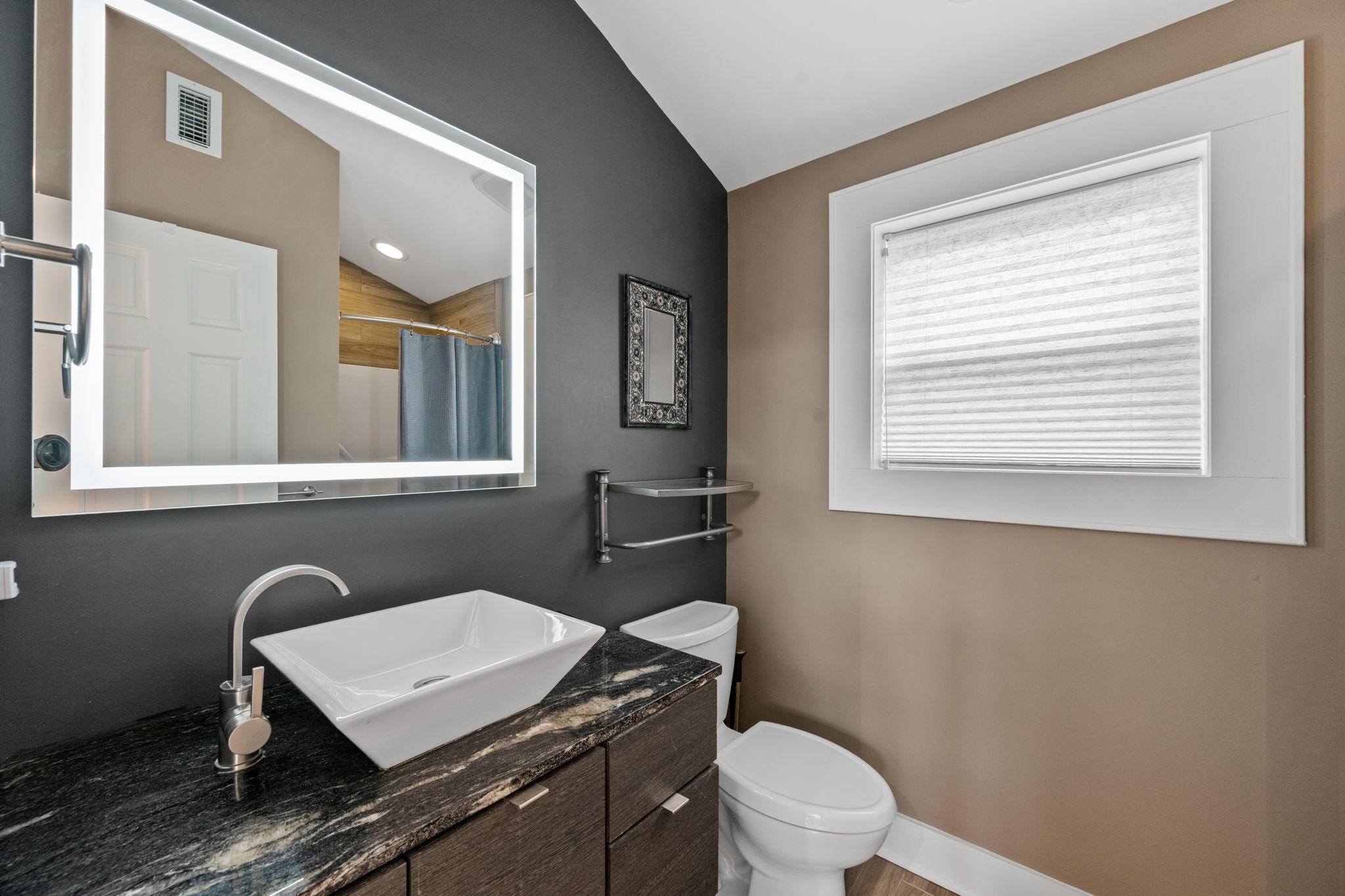 1911 Harold Street Houston, TX 77098 - Photo 26 of 36 Secondary garage apartment full bath offering a clean, well-appointed space designed for guest or extended-stay use.