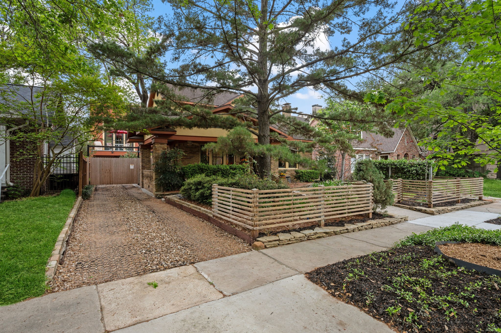 1911 Harold Street Houston, TX 77098 - Photo 29 of 36 Private gated driveway with direct access to the garage.