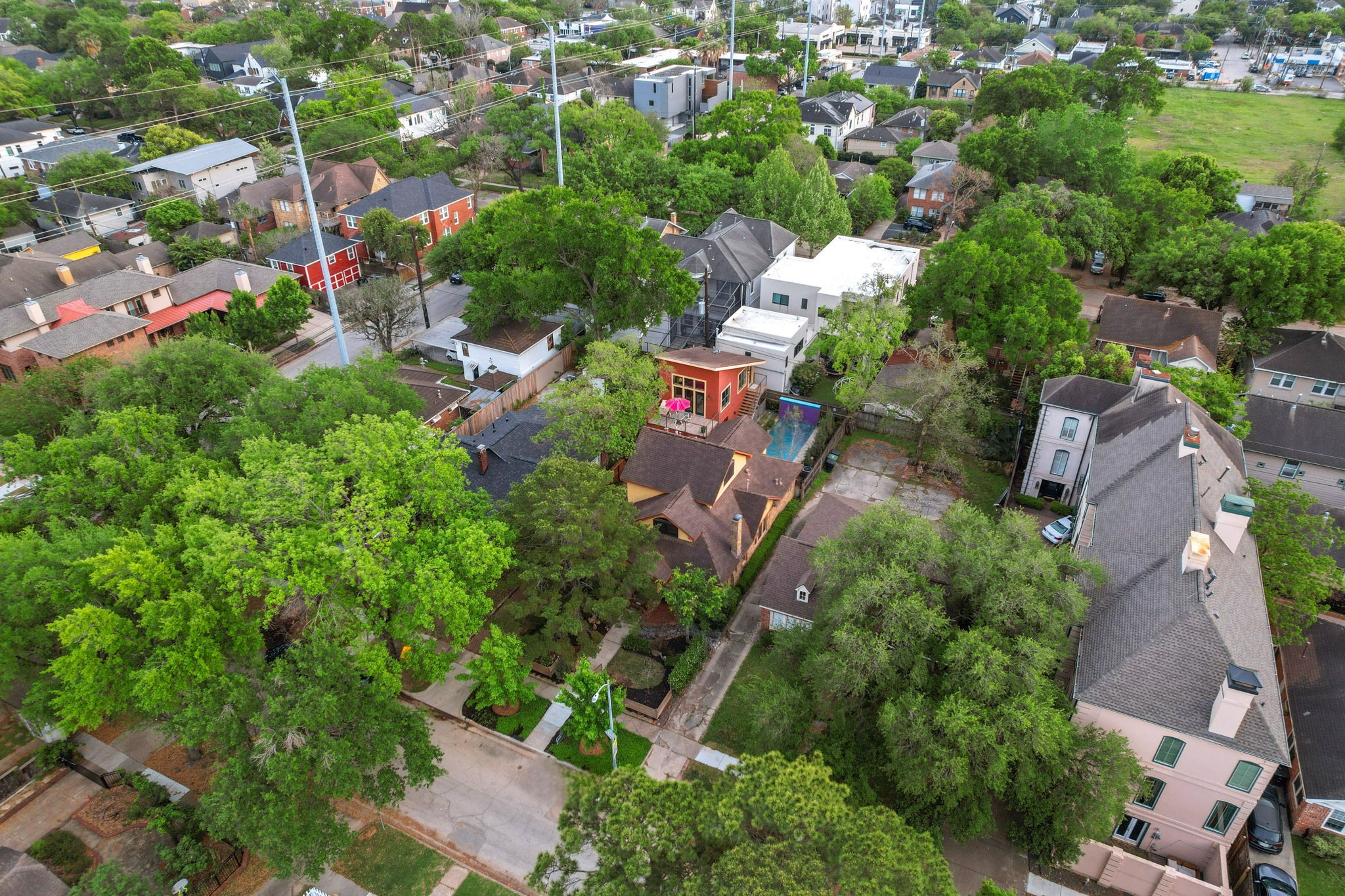 1911 Harold Street Houston, TX 77098 - Photo 33 of 36 Aerial perspective highlighting the surrounding residences and neighborhood layout.